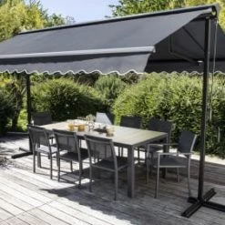 Oviala Parasols Store Double Gris Pente Motorisé Avec Coffre 3x4m -Tapis extérieur Soldes store double gris pente motorise avec coffre 3x4m 1